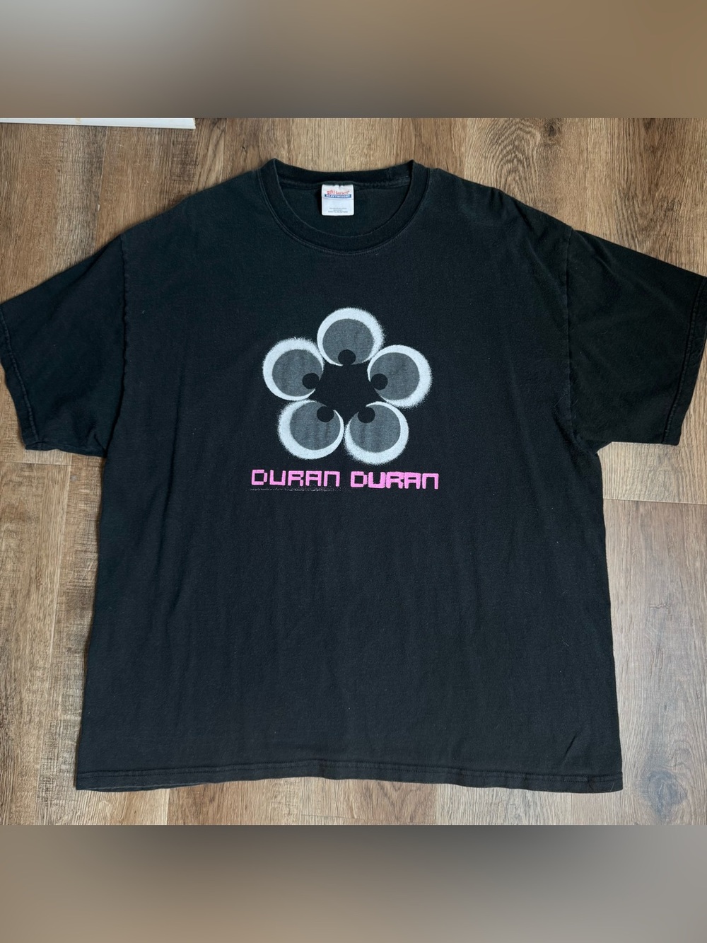 Vintage Duran Duran 2005 tour black t-shirt with white flower graphic and pink t